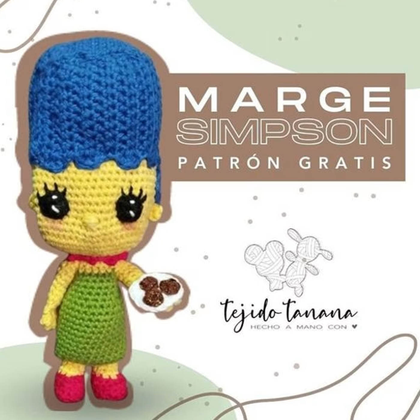 Muñeco amigurumi de Marge Simpson terminado, tejido a ganchillo, con su característico pelo azul y vestido verde.