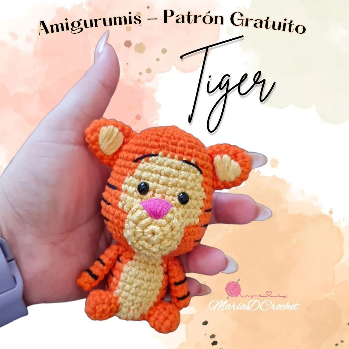 Tigger amigurumi terminado tejido a crochet con detalles en naranja y amarillo