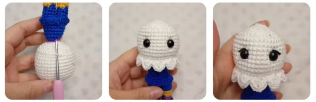 Manos tejiendo con ganchillo la cabeza y detalles de un amigurumi llamado Clutch de color blanco y azul.